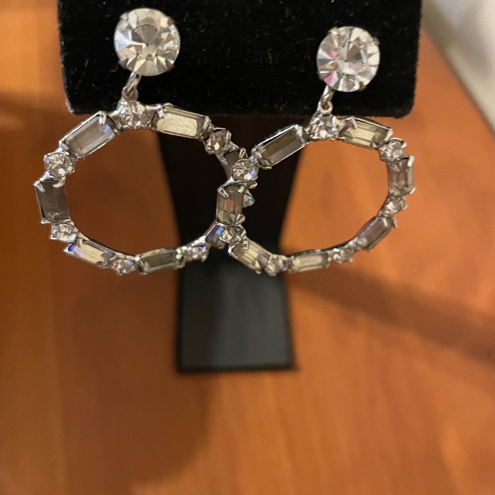 Silver Dangle Earrings with Large Circular Hoops and Sparkling Stones Prong Set